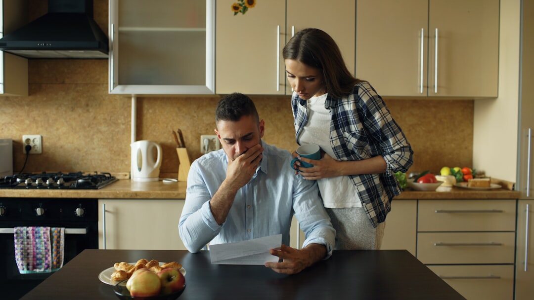 Turkish family reviewing inheritance documents together at a table